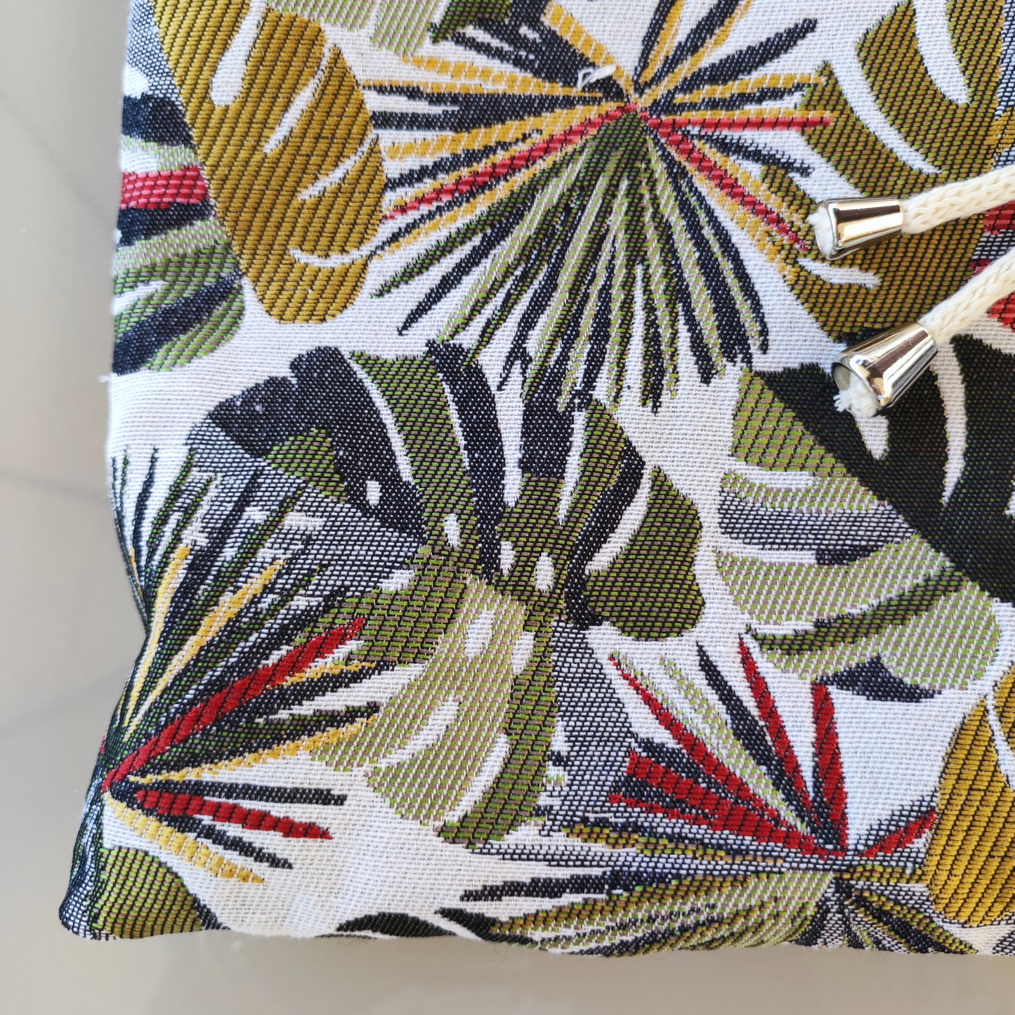 Pochette à livre jacquard Monstera